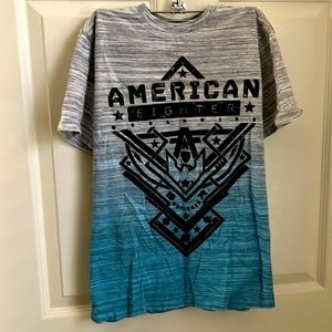Big boy’s American Fighter size medium tee shirt blue/gray color.